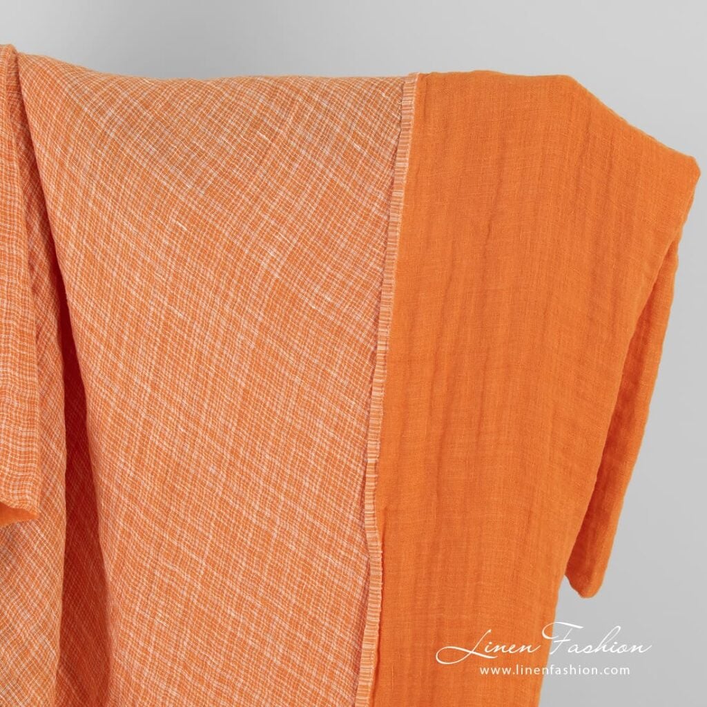 Double-sided orange linen fabric in checks