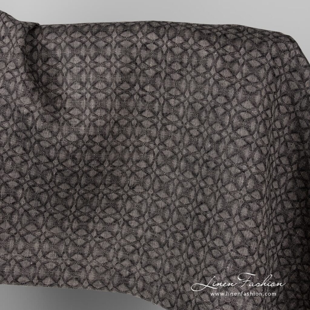 Black grey linen fabric in geometrical pattern.