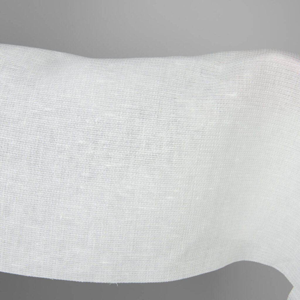 Off-white linen fabric in a small check pattern