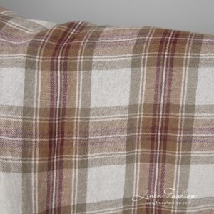 Wide washed half linen fabric off-white with brown checks close up detail