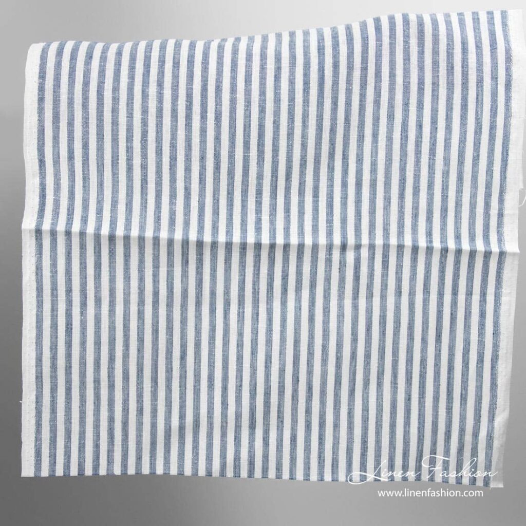 Narrow linen fabric white with denim blue stripes