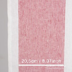 White linen fabric in crimson red stripes