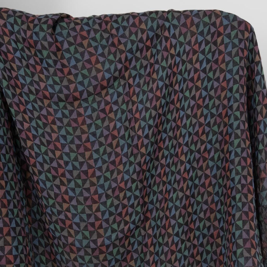 Washed linen fabric black with multicolour triangles