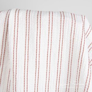 Cotton hemp fabric in brown stripes, specially washed to increase softness