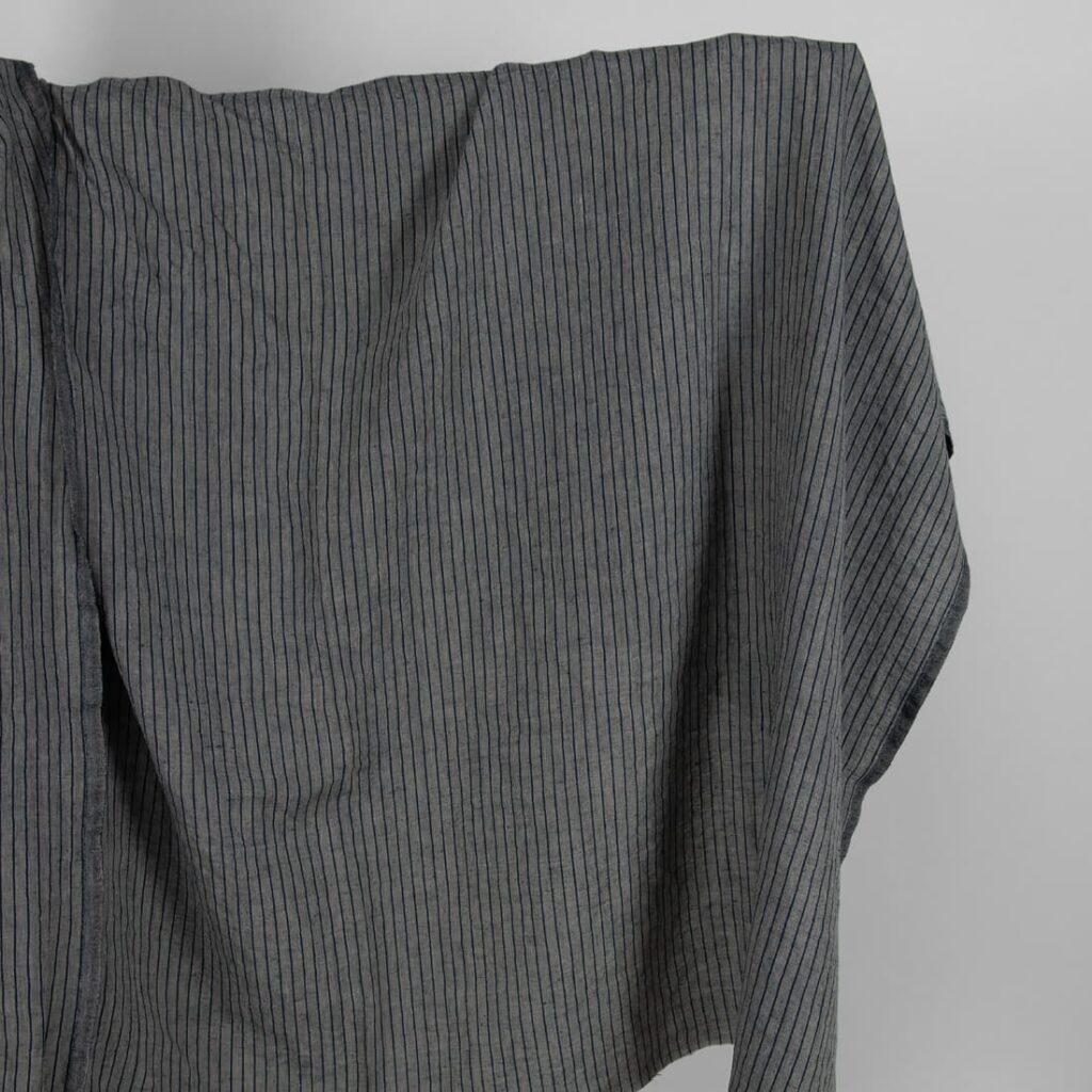 Washed linen fabric grey with thin black stripes