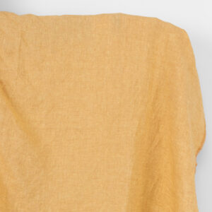 Linstoff lys gul og leire melert, vasket