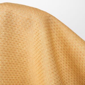 Linstoff lys gul og leirefarget prikkete