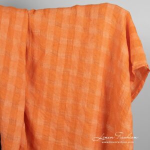 Orange linen fabric in transparent checks