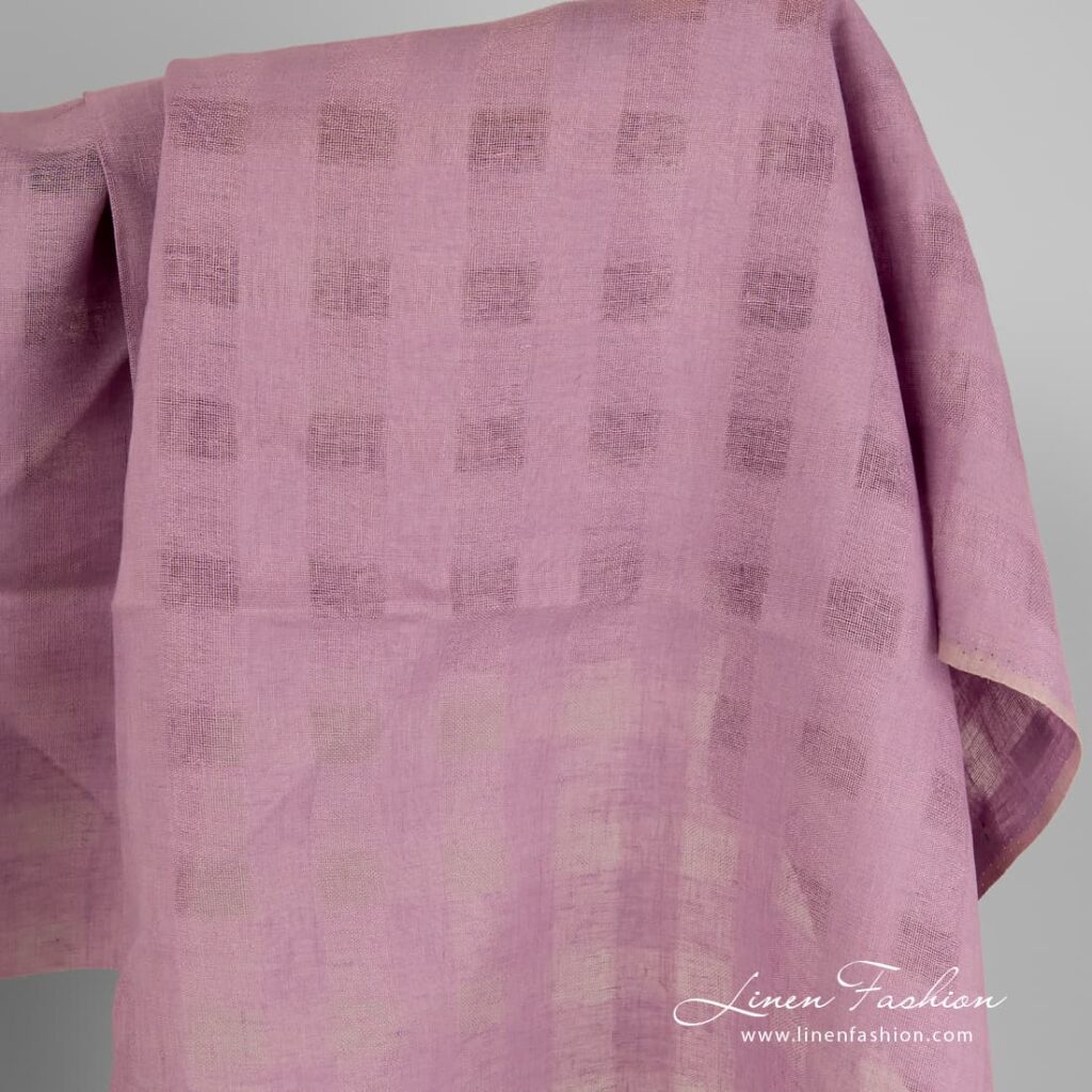 Lilac colour linen fabric with checks.