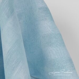 Checked linen fabric in aquamarine colour.