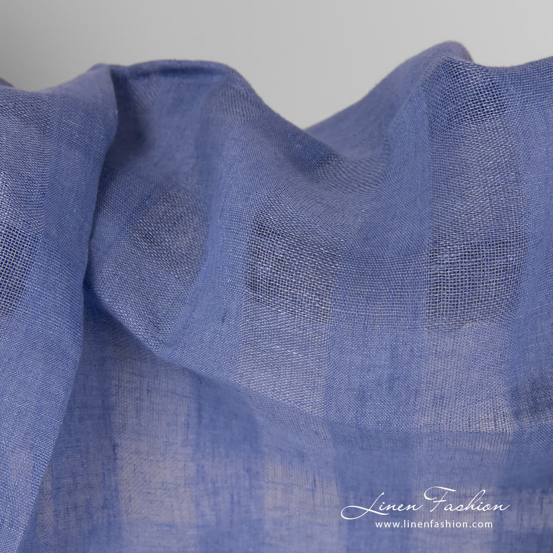 Checked linen fabric in violet blue.