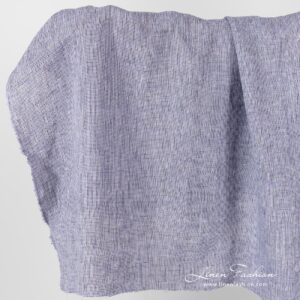 Linen fabric in black violet checks, washed.