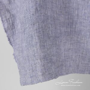 Checked linen fabric in violet black.
