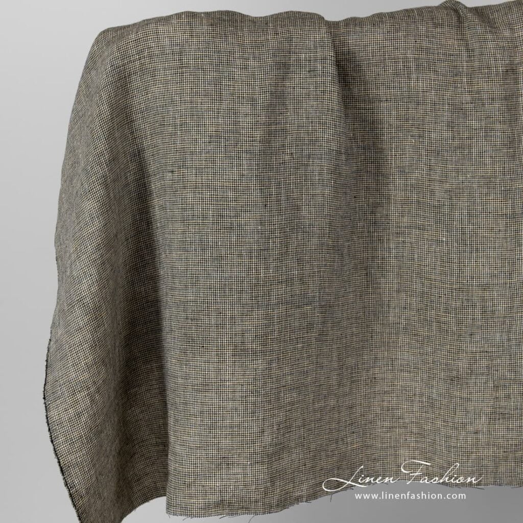 Linen fabric in black yellow checks, washed.