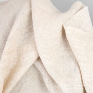 Linen fabric in light sand color, specially washed