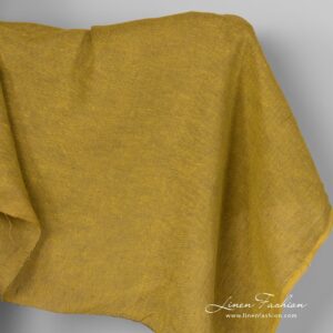 Yellow green linen fabric in diagonal pattern.