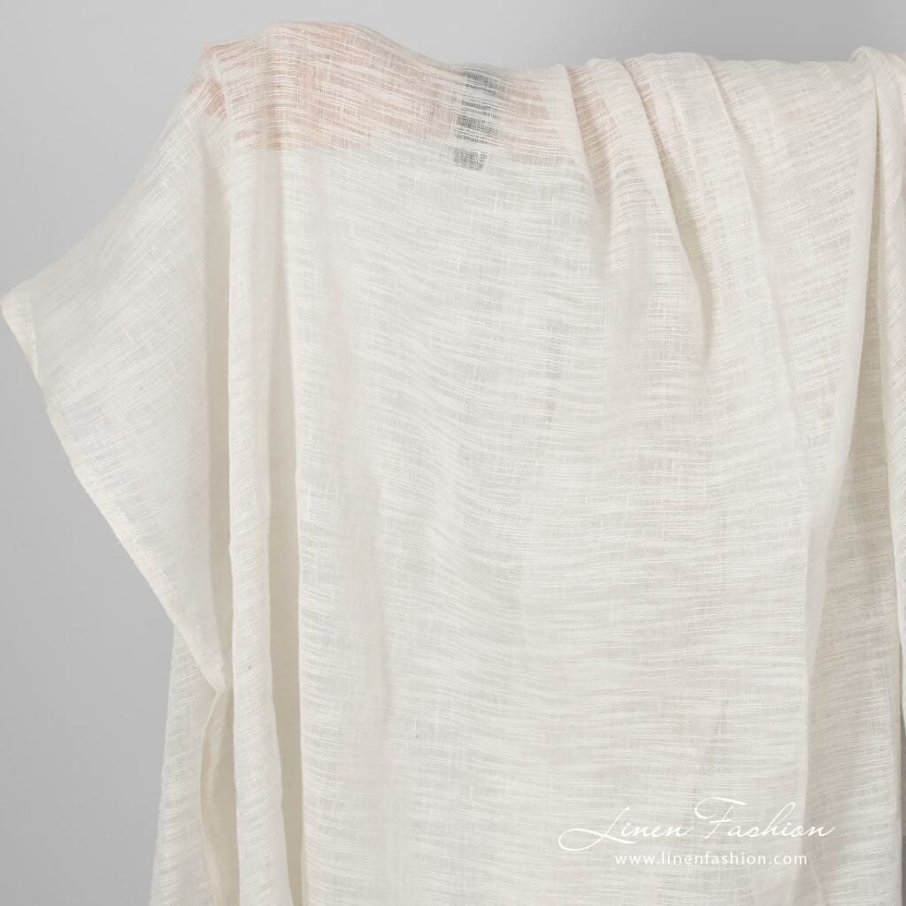 Off-white sheer linen / cotton fabric in stripes