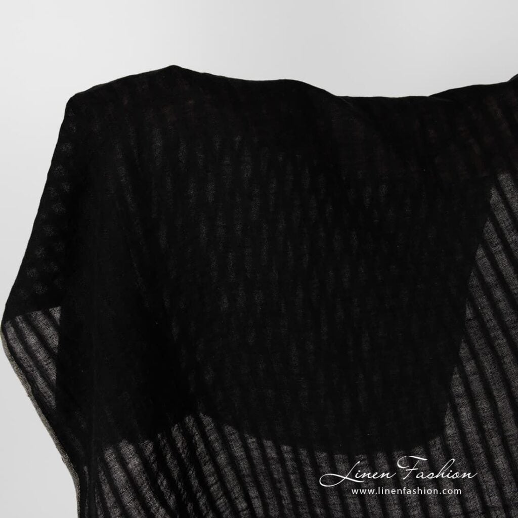 Washed black striped linen fabric.