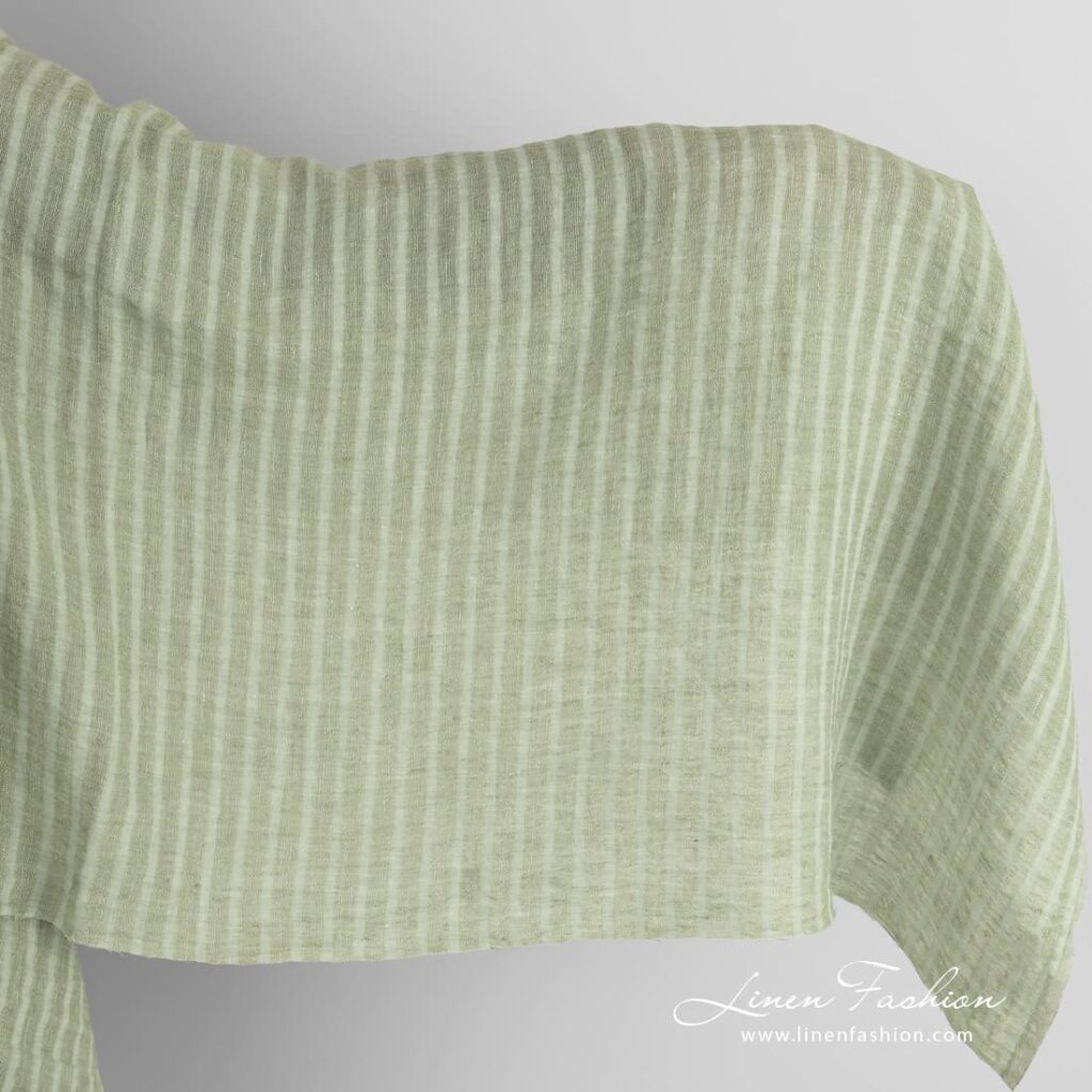 Green linen fabric in stripes