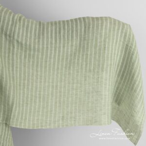 Green linen fabric in stripes