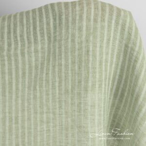 Green linen fabric in transparent stripes