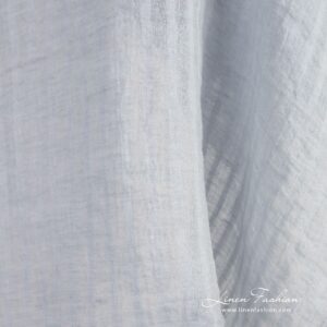 Blue linen fabric in vertical transparent stripes