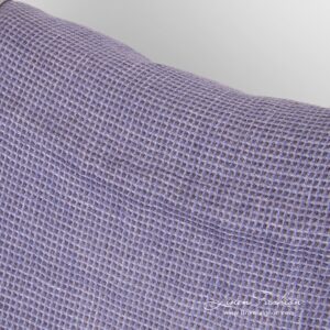 Linen fabric woven from several shades of violet color yarns