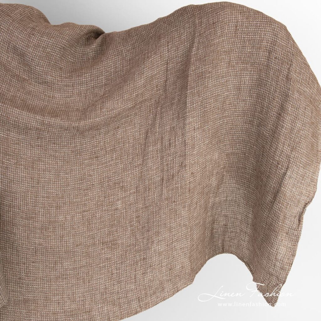 Brunt linstoff i vaffelmønster vasket 1 Brown linen fabric in "waffle" checks, washed