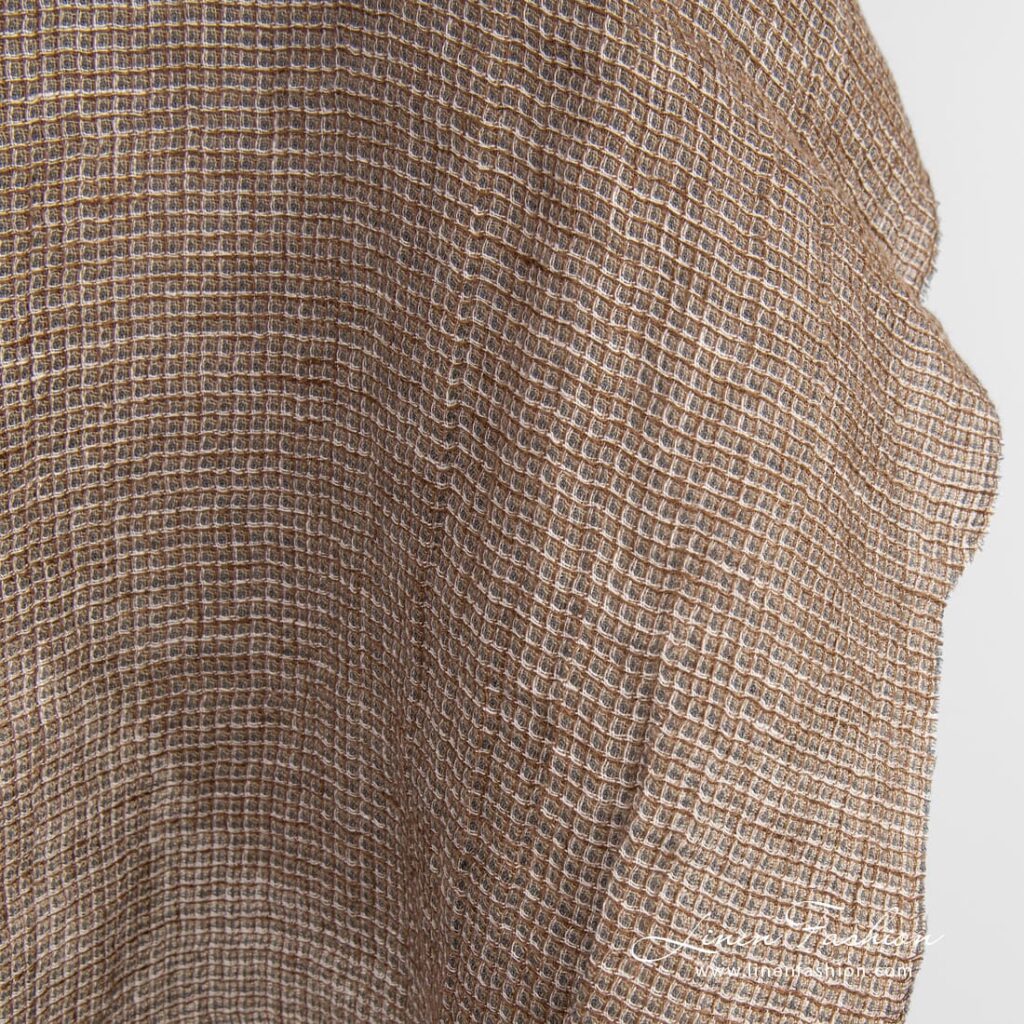 Brunt linstoff i vaffelmønster vasket 3 Linen fabric in several shades of brown color