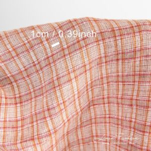 Oransje linstoff i ruter vasket 12 Checked linen fabric woven in white, orange, brown and red yarns