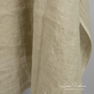 Linen fabric woven from yellowish brown and brownish grey yarns