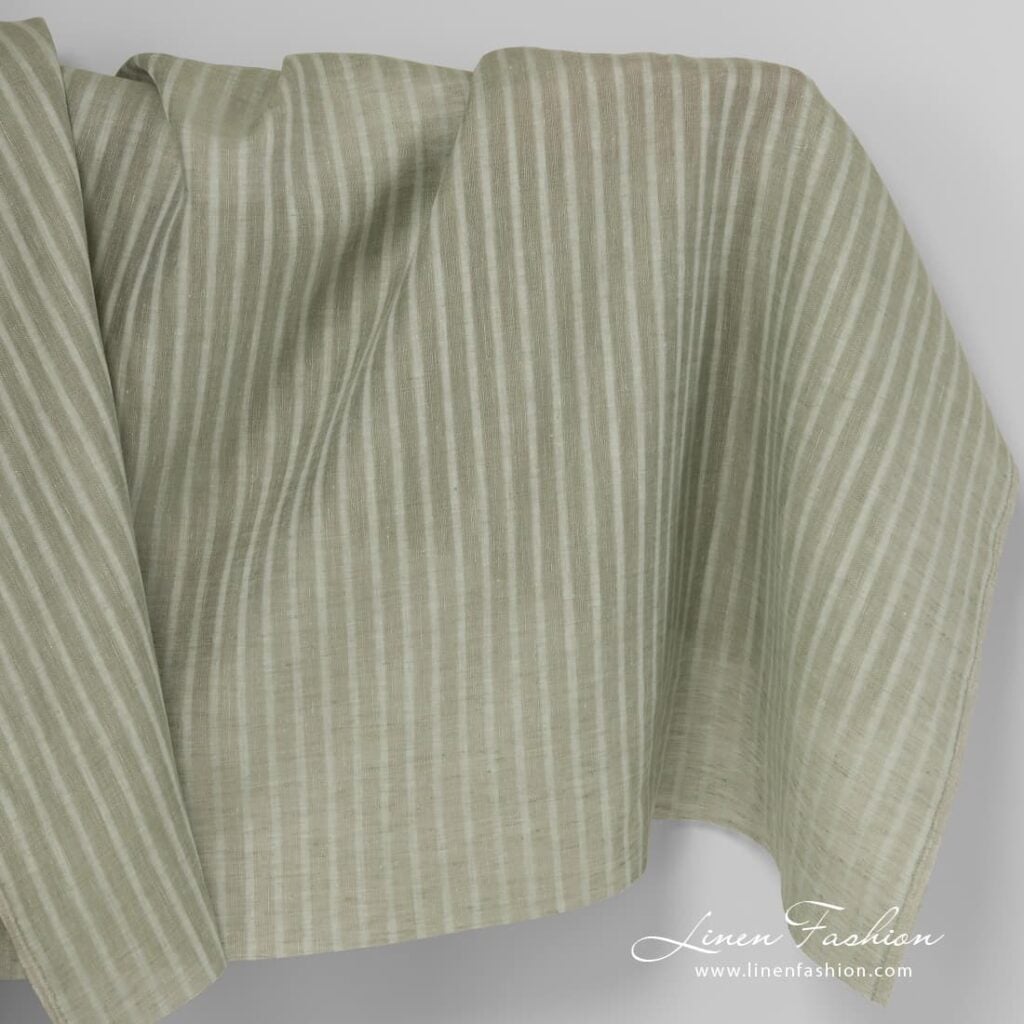 Green linen fabric in stripes.
