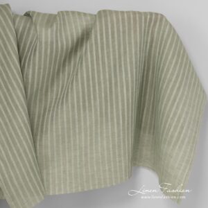 Green linen fabric in stripes.