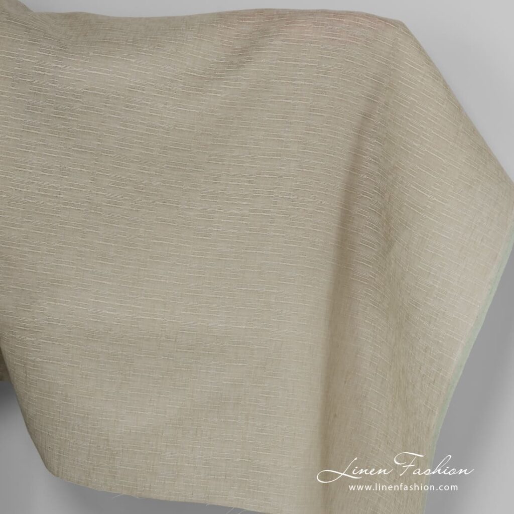 Linen fabric in light brown colour.