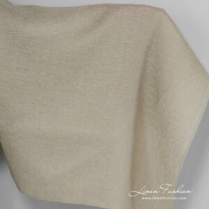 Linen fabric in light brown colour.