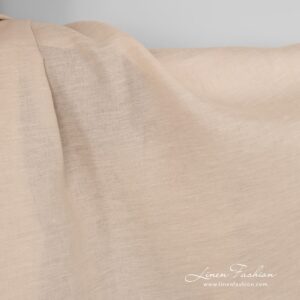 Linen fabric in cream melange.