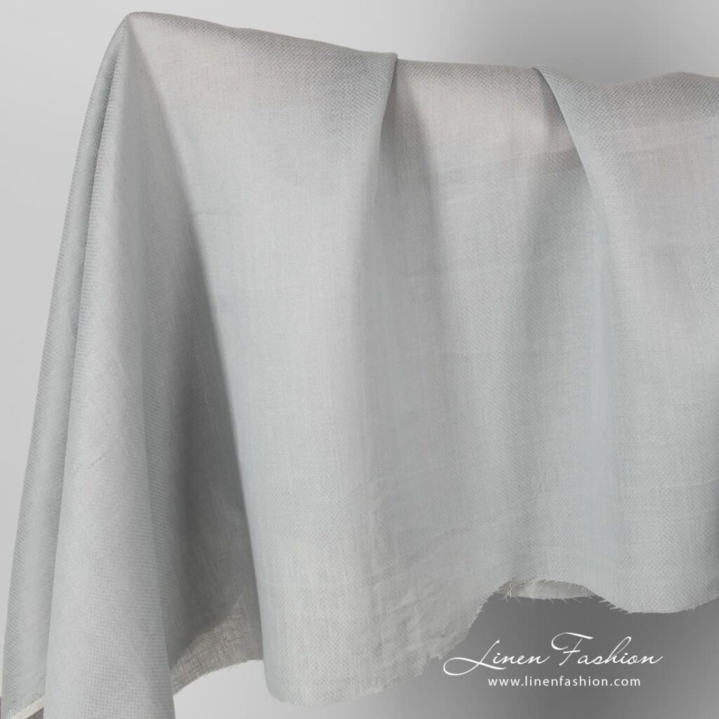 Patterned grey linen fabric.