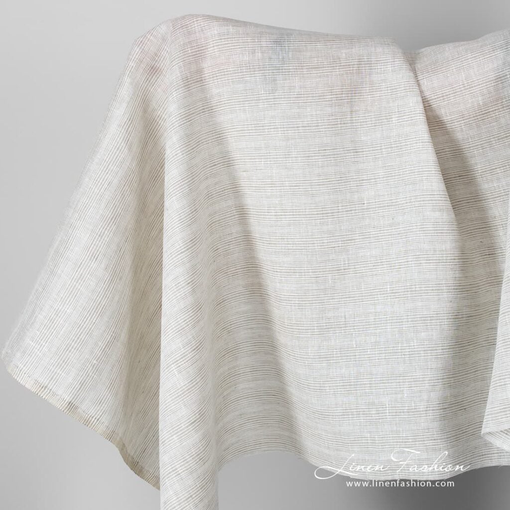 Linen fabric with brownish grey stripes.