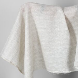 Linen fabric with brownish grey stripes.