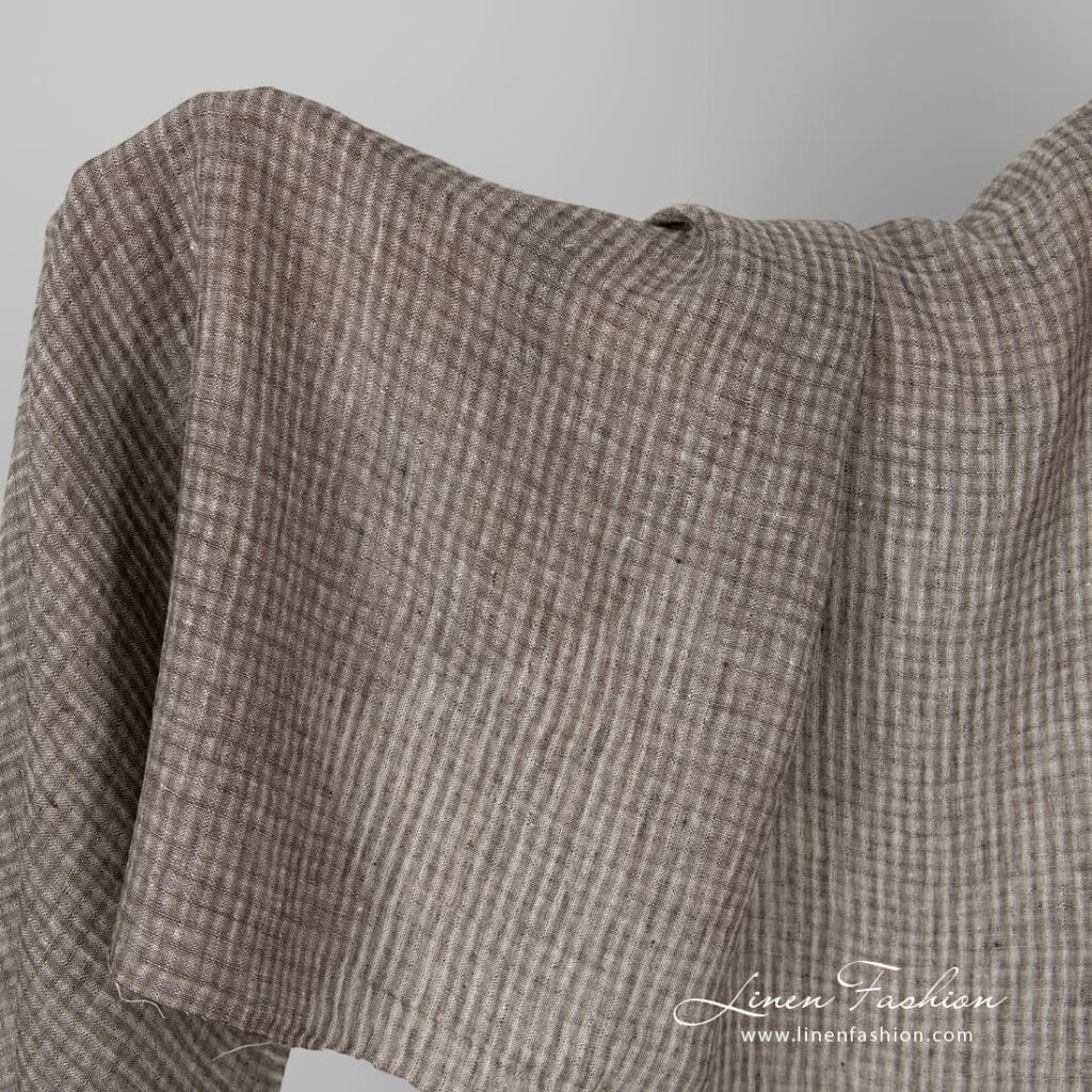 Linen fabric in brown checks, washed.