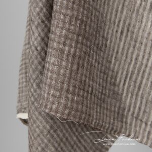Brown dyed linen fabric in checks.