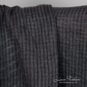 Linen fabric in transparent checks woven from black and dark grey yarns