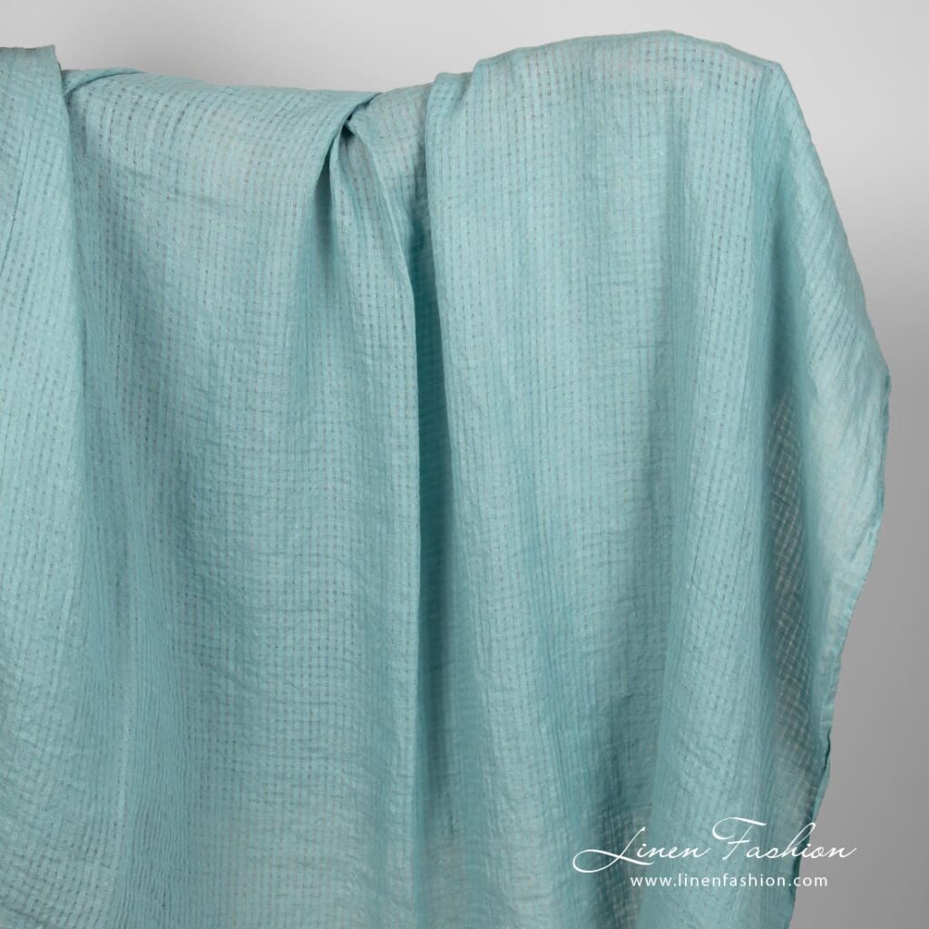 Blue green linen fabric in transparent checks