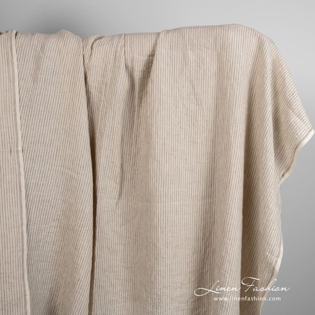 Linen fabric in light cocoa color with stripes