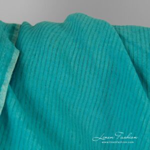 Striped linen fabric in turquoise color, washed