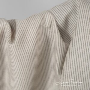 Beige linen fabric in stripes.