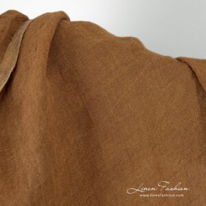 Transparent linen fabric in brown color, washed