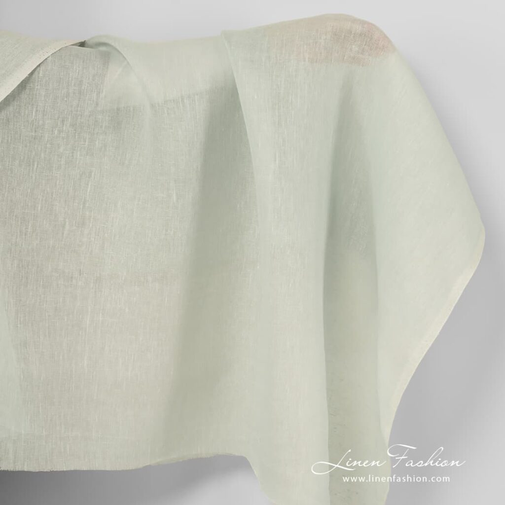 Pale green linen fabric.