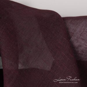 Linen fabric in burgundy colour.