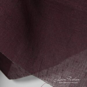 Burgundy dyed 100% linen fabric.